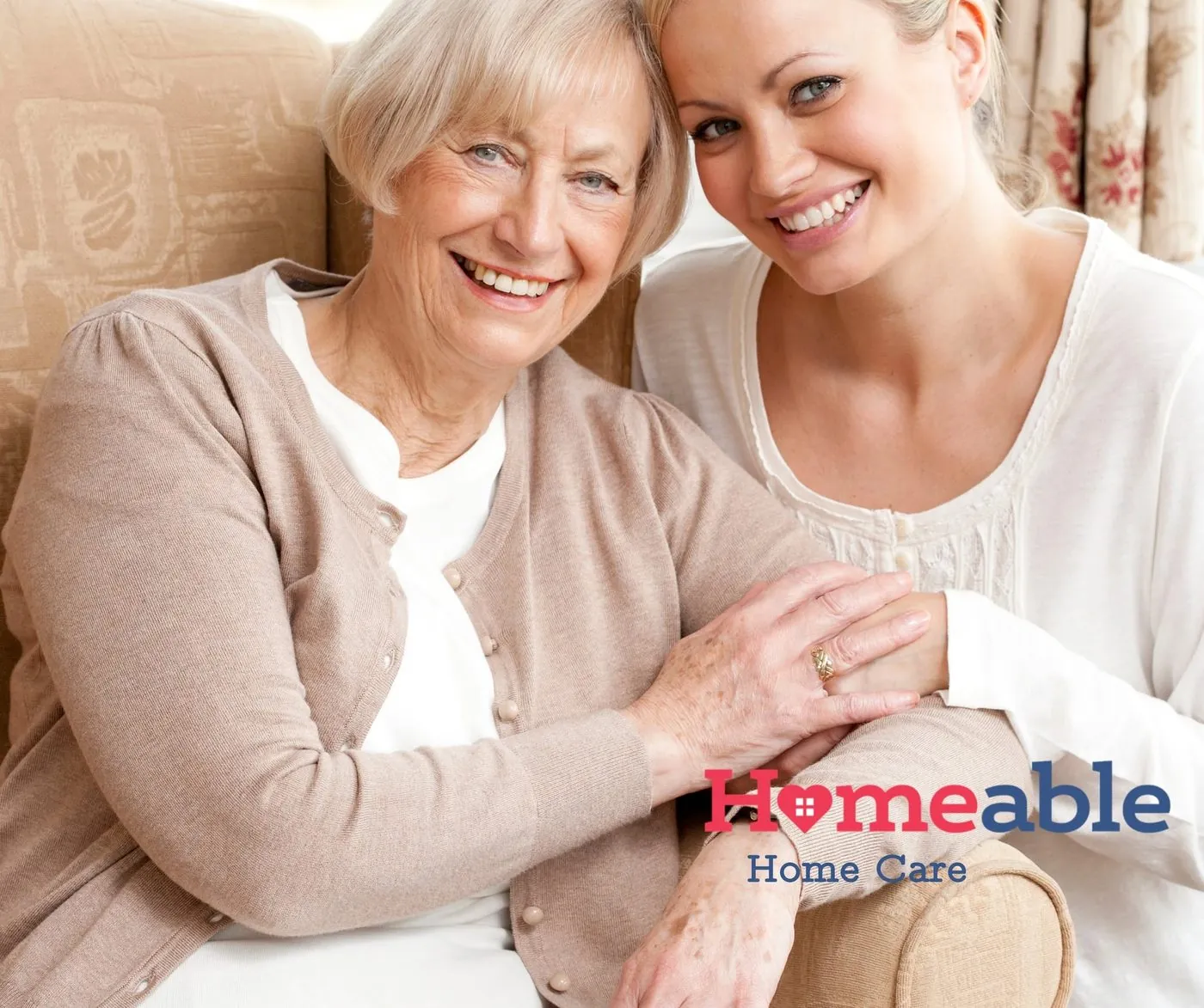 Older woman and a younger woman smiling together