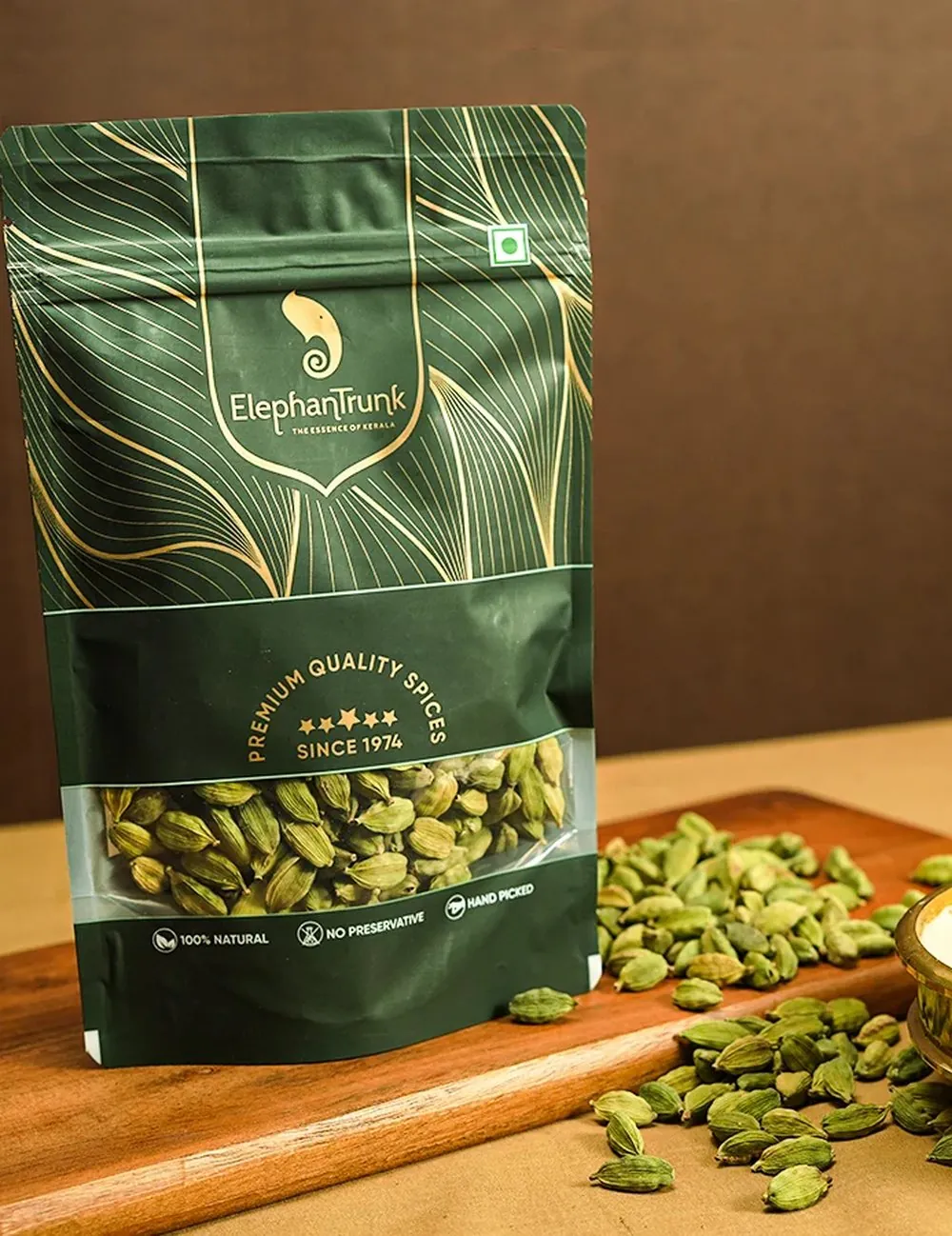 ElephantTrunk green cardamom pouch on a wooden board